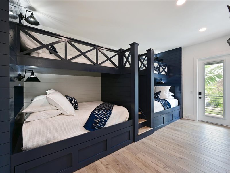 Bunk room with queen and twin bunks