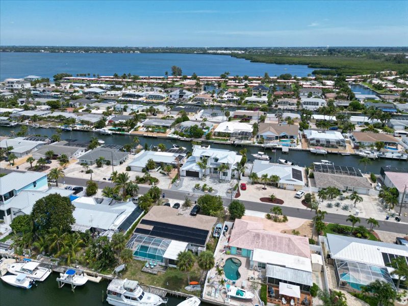 Aerial view of the canal-front home and dock